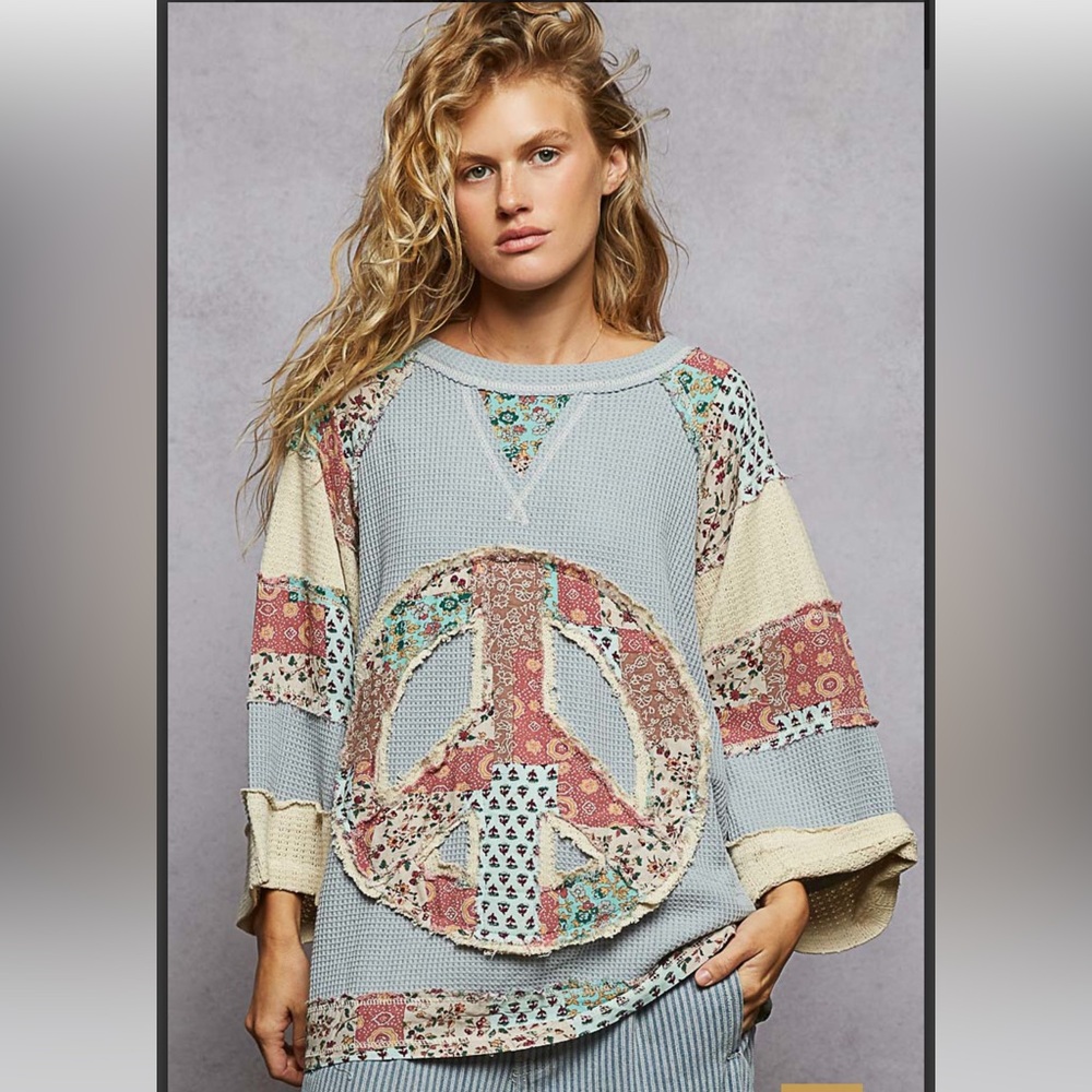 P668–(SHIPPED) POL Powder Blue and Cream Floral Peace Sweater Tunic